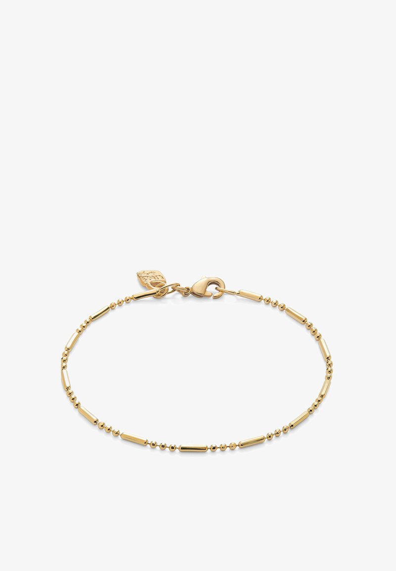 Pulsera de oro que presenta una mezcla de eslabones de cuentas redondeadas y alargadas, un cierre de langosta y una pequeña etiqueta para detalles. Acabado suave y brillante.