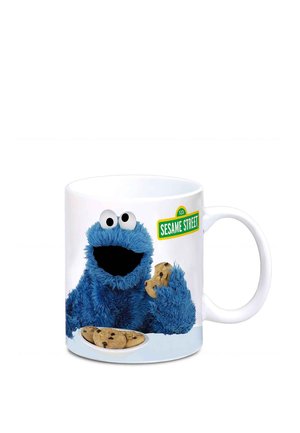 White mug with Cookie Monster holding a chocolate chip cookie and a plate of cookies, Sesame Street logo above the character.