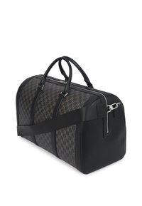 Melna ādas sporta soma ar brūnu rakstainu audumu. Aprīkota ar divām rokturiem, noņemamu siksnu un ar rāvējslēdzēja aizvērtu.