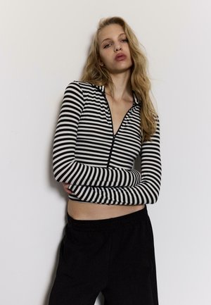 Vesta na kopčanje - white