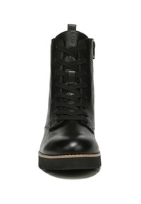 Black leather ankle boots with a smooth texture, featuring front laces and a side zipper. The sole is black with a subtle tan accent.