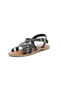 Zwarte leren sandalen met kruislings gespen, open teen en achterband met een gesp. Bruine binnenzool en geëxtrudeerde buitenzool.