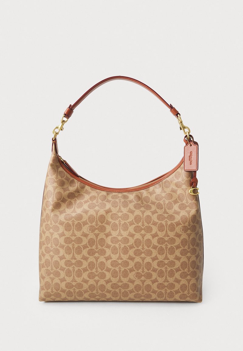 Borsa a mano color tan con un motivo circolare ripetuto, rifiniture in pelle, una sola tracolla e un'etichetta staccabile con logo attaccata. Finiture in oro.