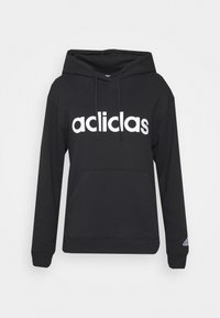 Czarna bluza z kapturem wykonana z bawełnianej mieszanki, z kieszenią typu kangur, kapturem ze sznurkiem oraz dużym białym logo "acilclas" na przodzie.