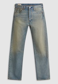 Siniset suorat farkut, joissa on haalistunut pesu, viisi taskua, vyölenkit ja nappikiinnitys vyötäröllä.