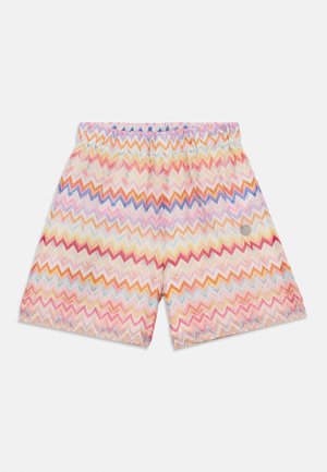Multifarvede zigzag-mønstrede shorts med elastisk taljebånd og lille rundt metallogo på højre side.