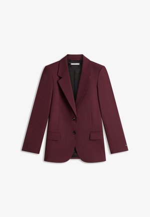 Damescolbert op maat in diep bordeauxrood met inslagkragen, twee voorknopjes, klepzakken en een zwart patroon voering aan de binnenkant.