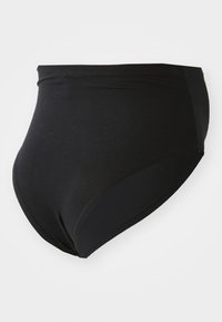 Culottes noires taille haute en coton stretch. Texture lisse, design classique avec une coupe couvrante.