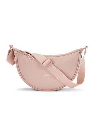 Pink fabric crossbody bag with a curved, semi-circular shape. Features a long adjustable strap, zip closure, and a subtle brand logo on the front.