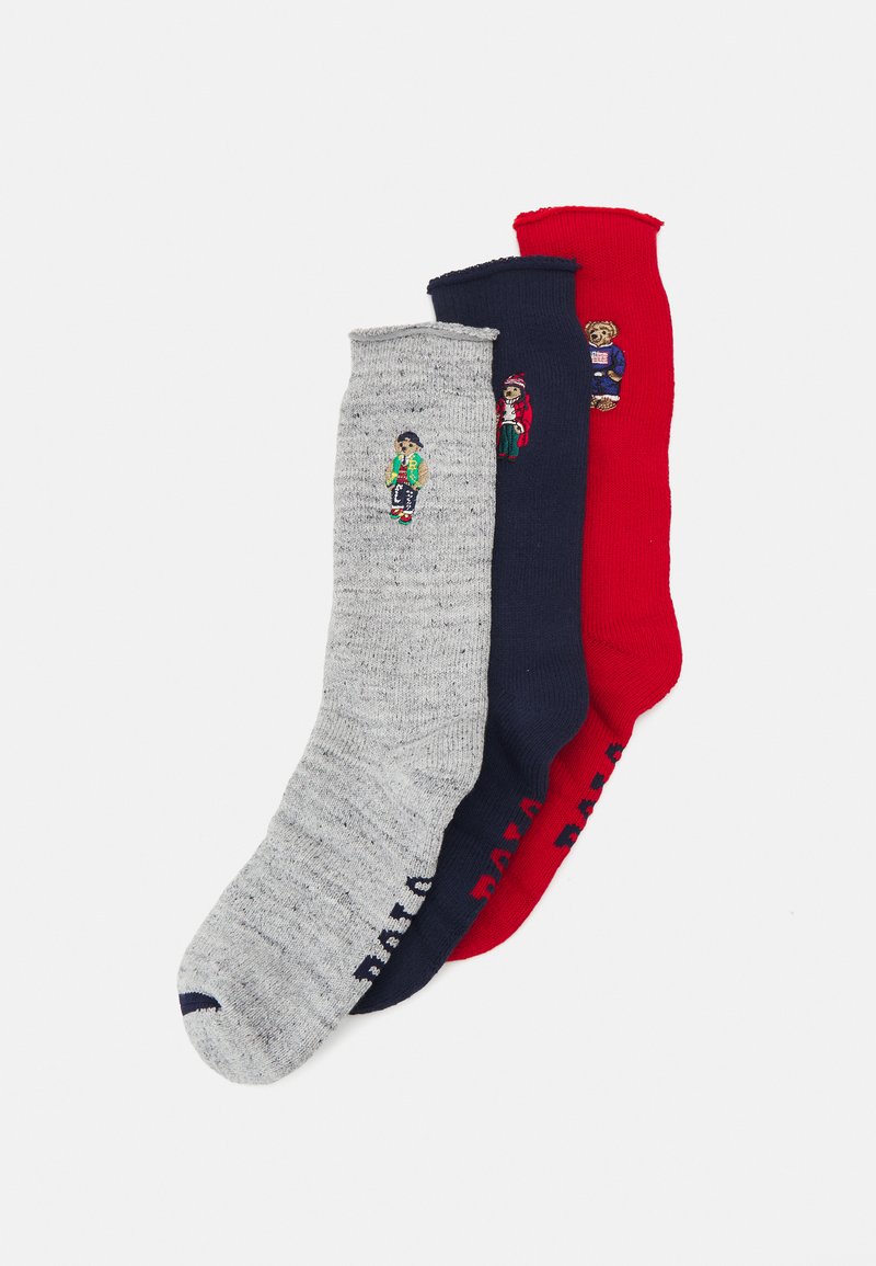 Three pairs of socks: gray with a character, navy with a different design, and red with a character; cotton blend, ribbed texture.