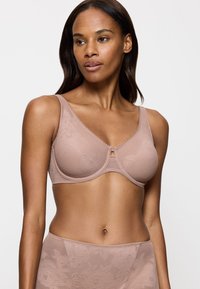 Melrose beige beha met bloemmotief, licht gewatteerde cups, brede bandjes en kantafwerking, voorzien van een sluiting aan de voorkant en een gladde afwerking.