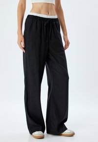 Koton Trainingsbroek - black
