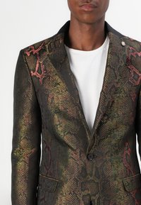 Twisted Tailor KOVEN zielony