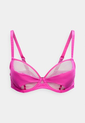 Φωτεινό ροζ σουτιέν με μπανέλα και ημιδιάφανα τούλινα πάνελ, ρυθμιζόμενους λεπτούς ιμάντες και λείες υφασμάτινες θήκες σε γκρι φόντο.