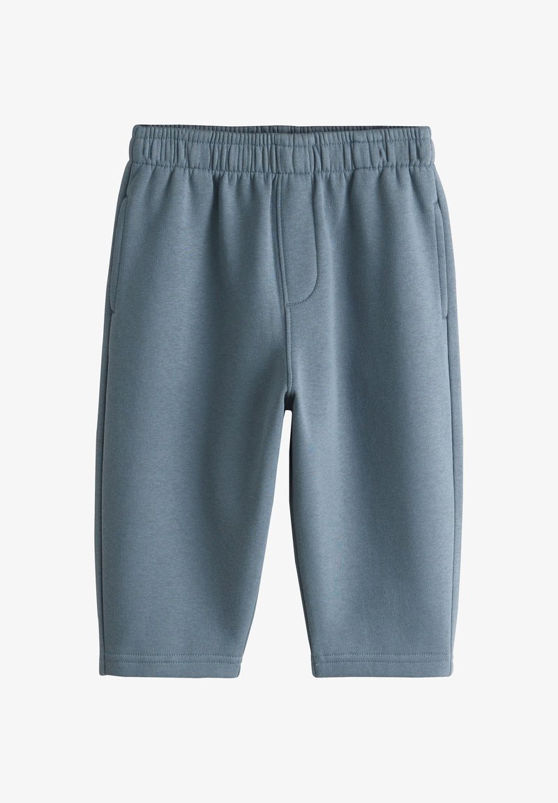 Short bleu doux à taille élastique avec poches latérales, longueur genou, fabriqué en tissu lisse adapté à une tenue décontractée.