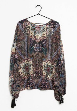 Przezroczysta bluzka z długim rękawem, ozdobiona wielokolorowym kwiatowym i geometrycznym wzorem, z okrągłym dekoltem i frędzlami przy krawędzi.
