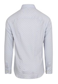 Lange mouwen shirt van lichtblauwe stof met een geometrisch patroon van kleine cirkels in beige en oranje. Licht gebogen zoom en knoopmanchetten.