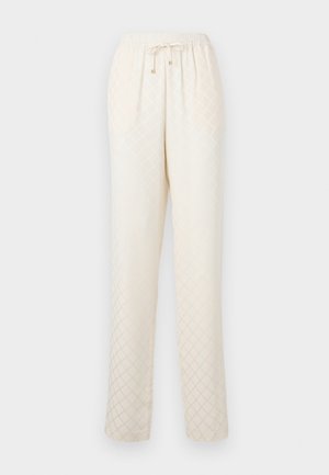 Pantalons de détente beige clair en tissu doux, avec un motif en losanges, une taille élastique avec cordon de serrage et des jambes droites décontract�ées.