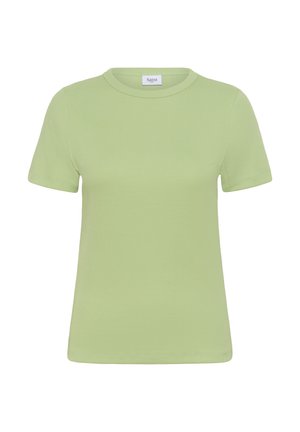 Jasnozielona, żeberkowana koszulka z krótkim rękawem i okrągłym dekoltem z małą białą metką z napisem "Saint" wewnątrz kołnierza.