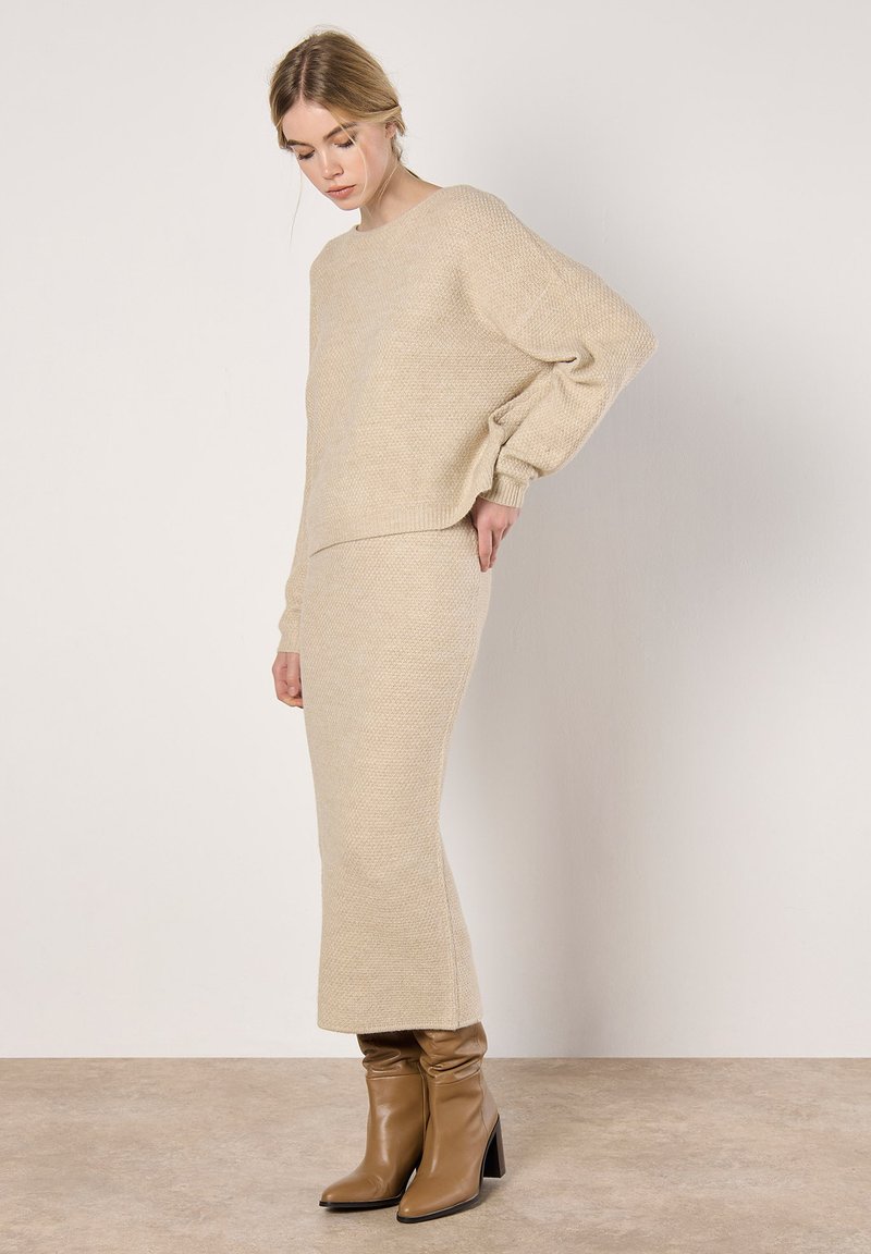 Apricot Kokerrok graniet