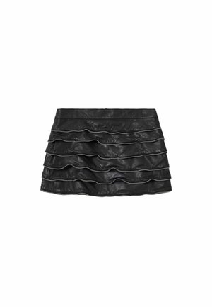 Black leather mini skirt with layered ruffles and silver zippers along the edges, featuring a smooth texture and a fitted silhouette.