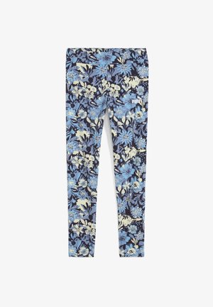 Virágmintás leggings sötétkék háttérrel, kék és krémszínű virágokkal. Ruganyos anyag, testhezálló dizájn, és egy kis fehér logó az oldalon.