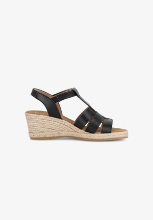 Sandale compensée en cuir noir avec bout ouvert et bride arrière, dotée d'une semelle espadrille en jute tressé.
