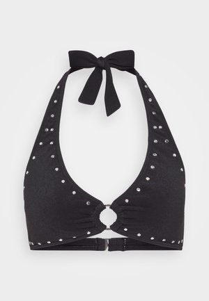 Black halter bikini top with a tie closure, adorned with silver studs, featuring a circular metal ring at the center and textured fabric.