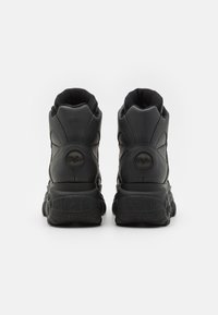 Buffalo Aukšto profilio sportbačiai - black