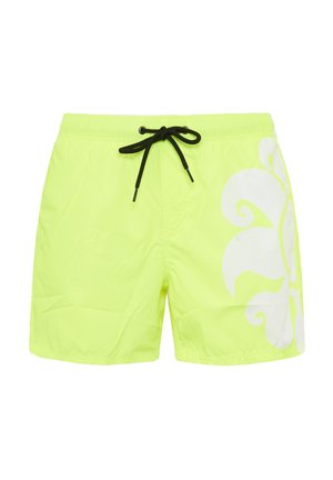 Shorts da bagno giallo neon realizzati in tessuto leggero, con cordino nero e un ampio motivo floreale bianco sul lato sinistro.