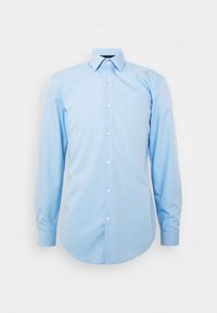 Lichtblauwe lange mouwen shirt gemaakt van katoen. Voorzien van een klassieke kraag, knopen aan de voorkant en een afgeronde zoom. Gladde textuur zonder zichtbare patronen.