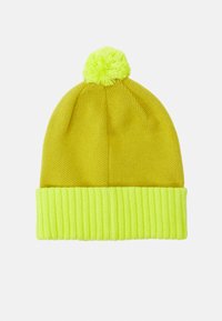 Knit beanie in bright yellow with a ribbed neon green cuff and a pom-pom on top. Made from soft, textured fabric.