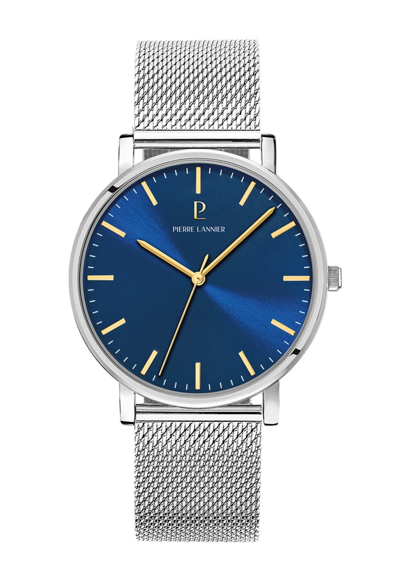 Orologio con cinturino in rete argento e quadrante blu, indicatori e lancette delle ore dorati, e cassa rotonda. Presenta un logo del marchio nella posizione delle 12.