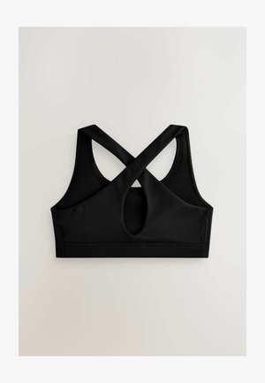 Fekete sportmelltartó, sima, rugalmas anyagból, versenyháti kialakítással, keresztpántokkal és kulcslyuk kivágással a hátoldalon.