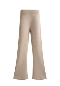 Beige wijde gebreide broeken met een elastische tailleband, ontworpen voor comfort en casual gebruik.