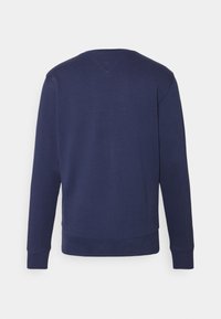 Mörkblå sweatshirt, tillverkad av bomullsblandning, med rundad halsringning, långa ärmar samt ribbade mudd och nederkant. Enkel design i enhetlig färg.