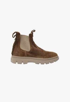Stivale Chelsea in pelle scamosciata marrone con pannelli laterali elastici beige, suola beige spessa e linguette intrecciate sul tallone e sul davanti.