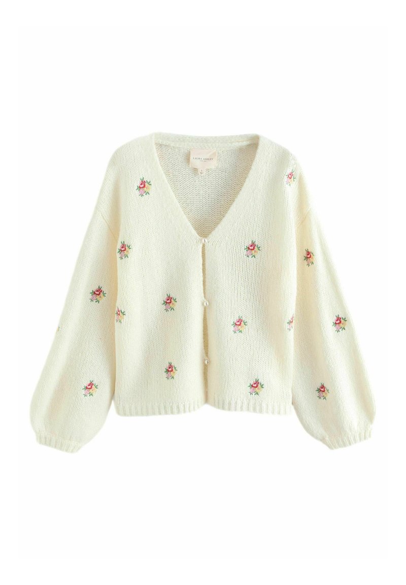 Cardigan lavorato a maglia color crema con scollo a V, maniche lunghe a palloncino e ricami floreali. Presenta bottoni perlescenti lungo la parte frontale.