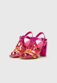 Marco Tozzi Aukštakulniai sandalai - pink