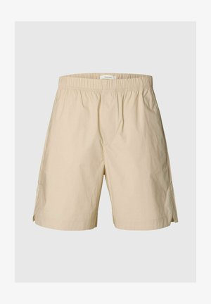 Beige shorts til knærne med elastisk midje og sidesliss, laget av lett stoff, forfra.