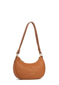 Tan leather shoulder bag with a curved shape, gold hardware, and a zipper closure. Features a rounded strap and embossed logo on the front.