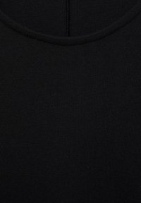 Black cotton t-shirt with a round neck and ribbed texture. Simple design with no visible patterns or accents. Soft and smooth appearance.
