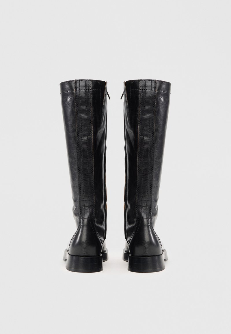 Black leather knee-high boots with a smooth finish, featuring a side zipper, reinforced stitching, and a low block heel.
