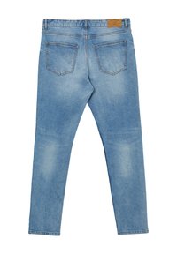 Jeans in denim blu chiaro con una vestibilità slim, dotati di cinque tasche, cuciture in evidenza e una patch in pelle sulla vita. Texture liscia.