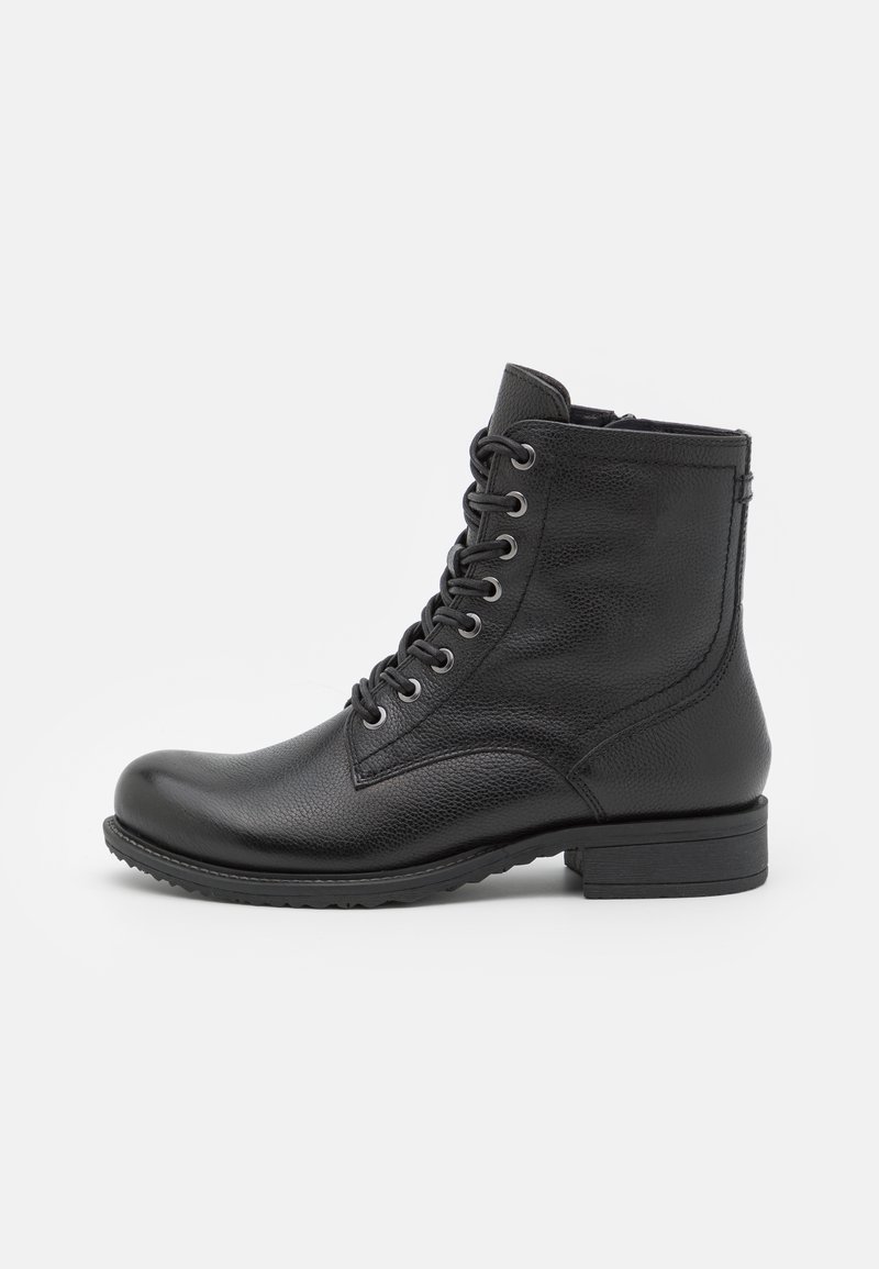 Bottines en cuir noir avec une finition texturée, dotées de lacets, d'un bout rond et d'un talon bas en bloc. Semelle en caoutchouc légère.