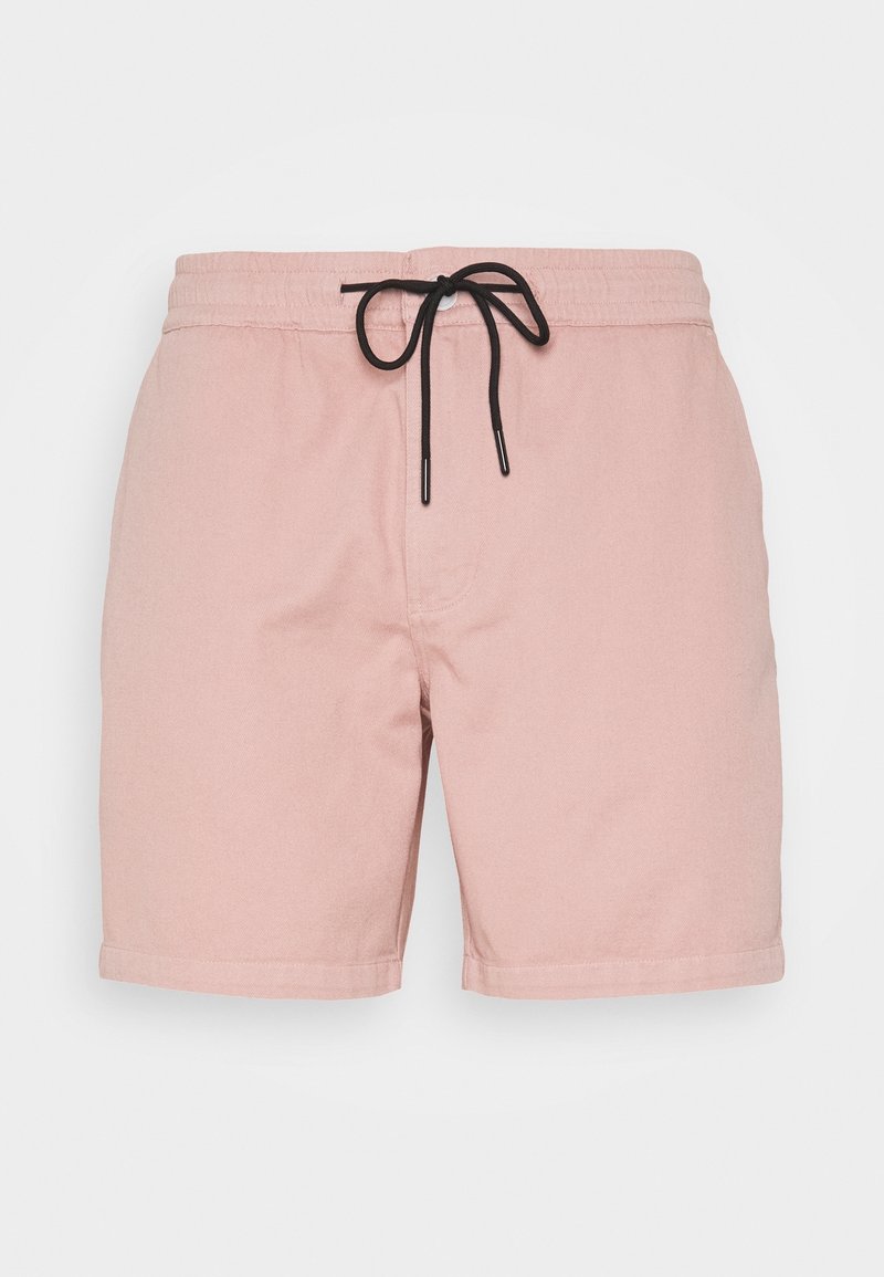 Short rose clair avec taille élastique et cordon noir, présenté à plat sur fond blanc. Aucun motif ou logo visible.