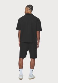 Pegador TROY - Šortky - black