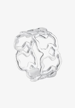 Silver openwork ring featuring interconnected abstract floral shapes with smooth, polished surfaces and rounded edges.
