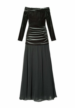 Robe de soirée noire avec un haut en velours décolleté, un corsage froncé et une jupe en chiffon fluide. Manches longues, texture lisse, silhouette élégante.