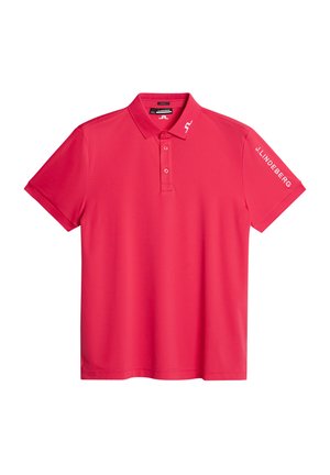 Red polo shirt with short sleeves, a collar, and three buttons. Features "J. Lindeberg" logo printed in white on the left sleeve. Smooth texture.